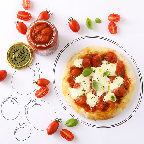 Buffalo mozzarella and grape tomato gourmet pizza